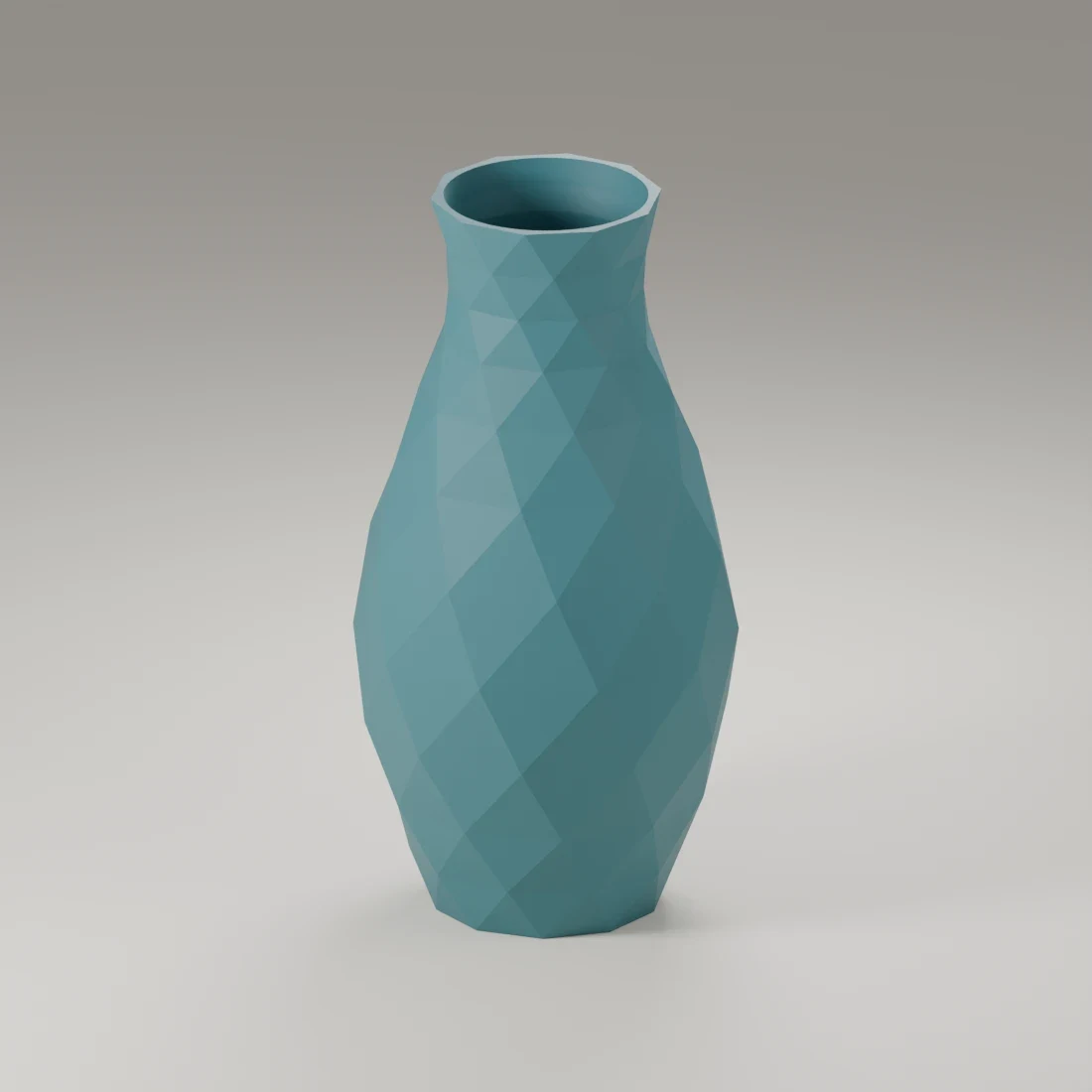 The faceted vase in Deep teal